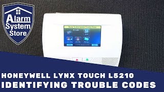 How To Clear Trouble Conditions On Honeywell Lynx L5210  AlarmSystemStore [upl. by Arrais]