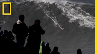 Watch Surfer Ride RecordBreaking Wave  National Geographic [upl. by Rather]