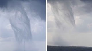 Man Captures Massive MultipleVortex Waterspout [upl. by Ial401]