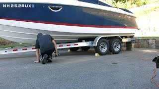 Repositioning a 25 Boat on its trailer while in the driveway [upl. by Aerdnaed920]