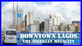 Downtown LAGOS NIGERIA  Discover the African megacity  From Balogun market to VI Ikoyi and Lekki [upl. by Anitnemelc]